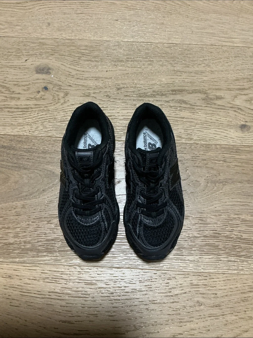 New Balance kids Black Athletic Running Shoes